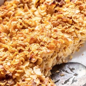 Apple cinnamon noodle kugel topped with crushed corn flakes and cinnamon sugar.