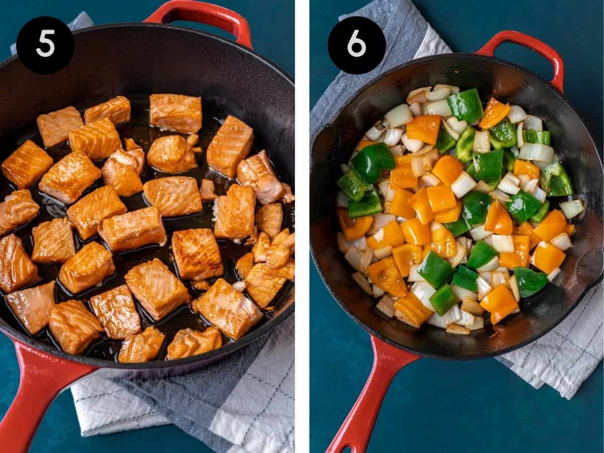 Cooked salmon in a skillet and stir fried peppers and onions in a skillet.