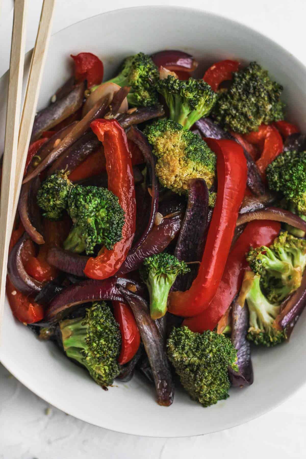 A bowl of stir fried veggies.