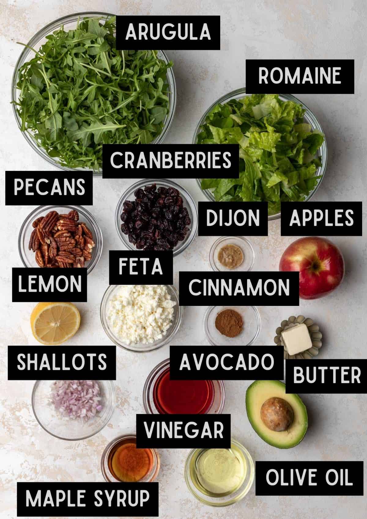 Labelled ingredients for apple, avocado, and arugula salad (see recipe for details).