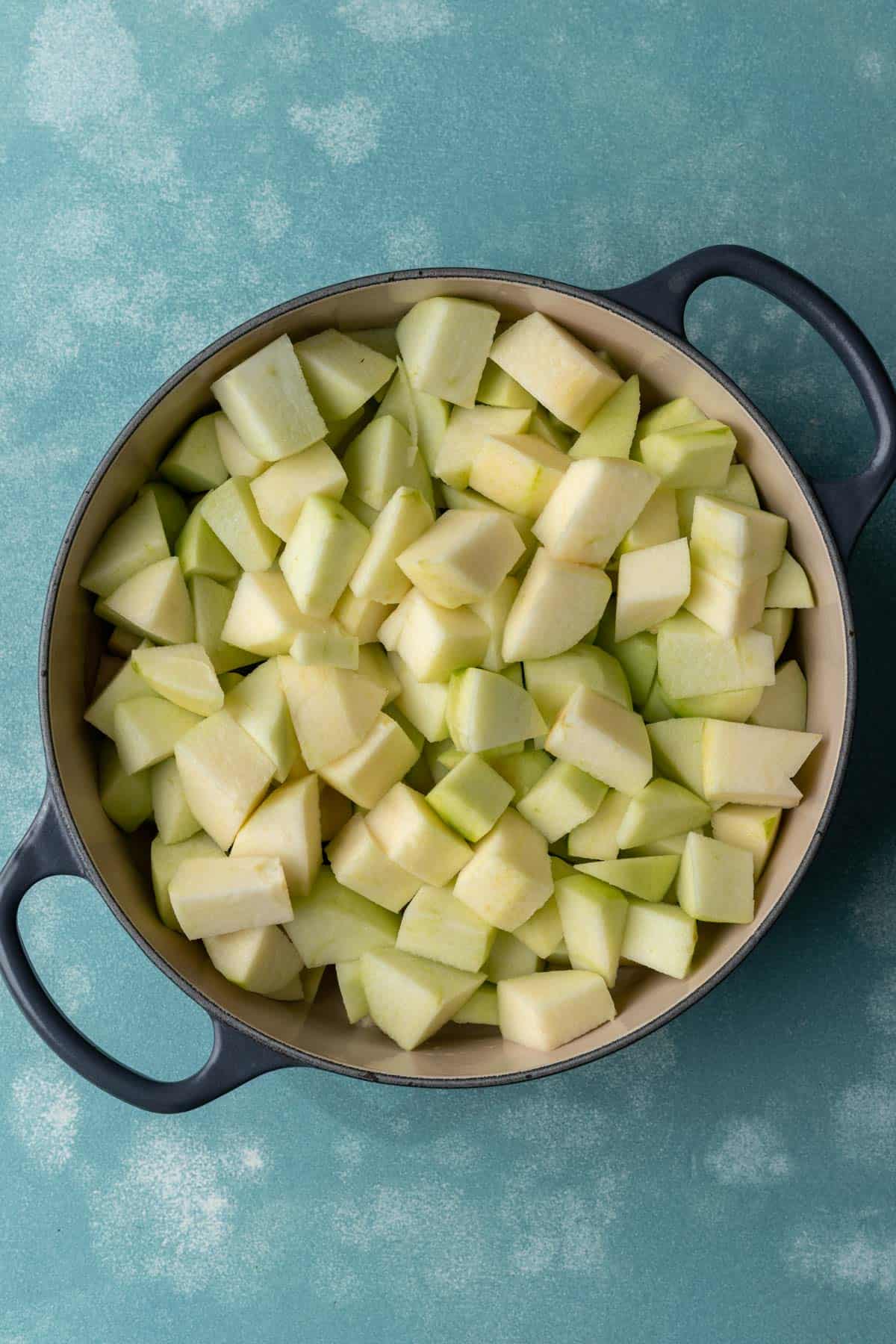 Chopped apples in a large stock pot.