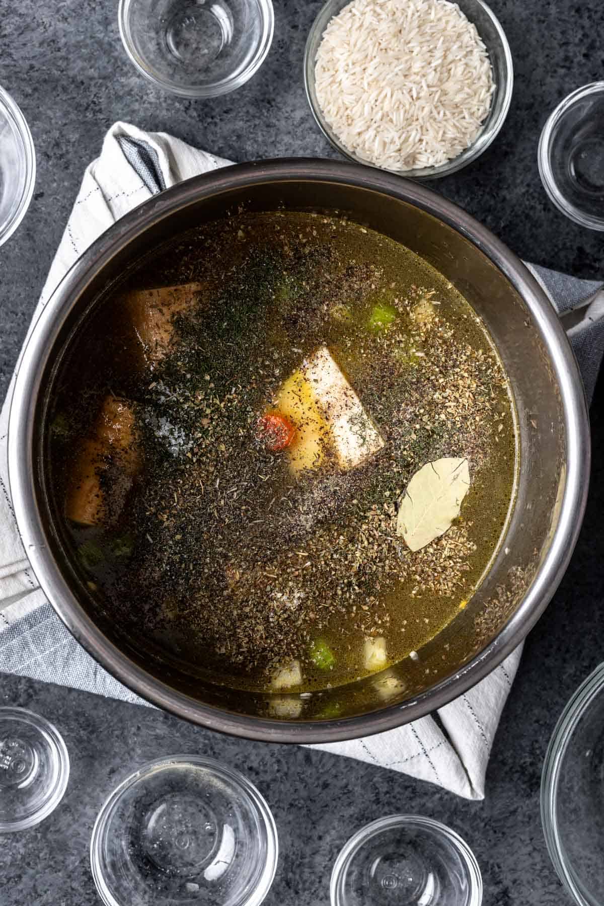 Parsnips, seasoning, chicken broth, and water added to the instant pot.