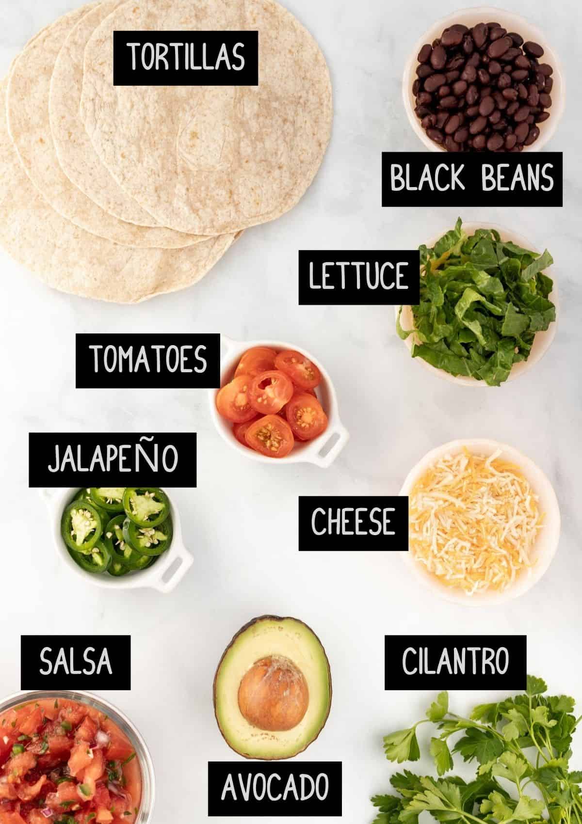 Labelled ingredients for topping fajitas (see recipe for details).