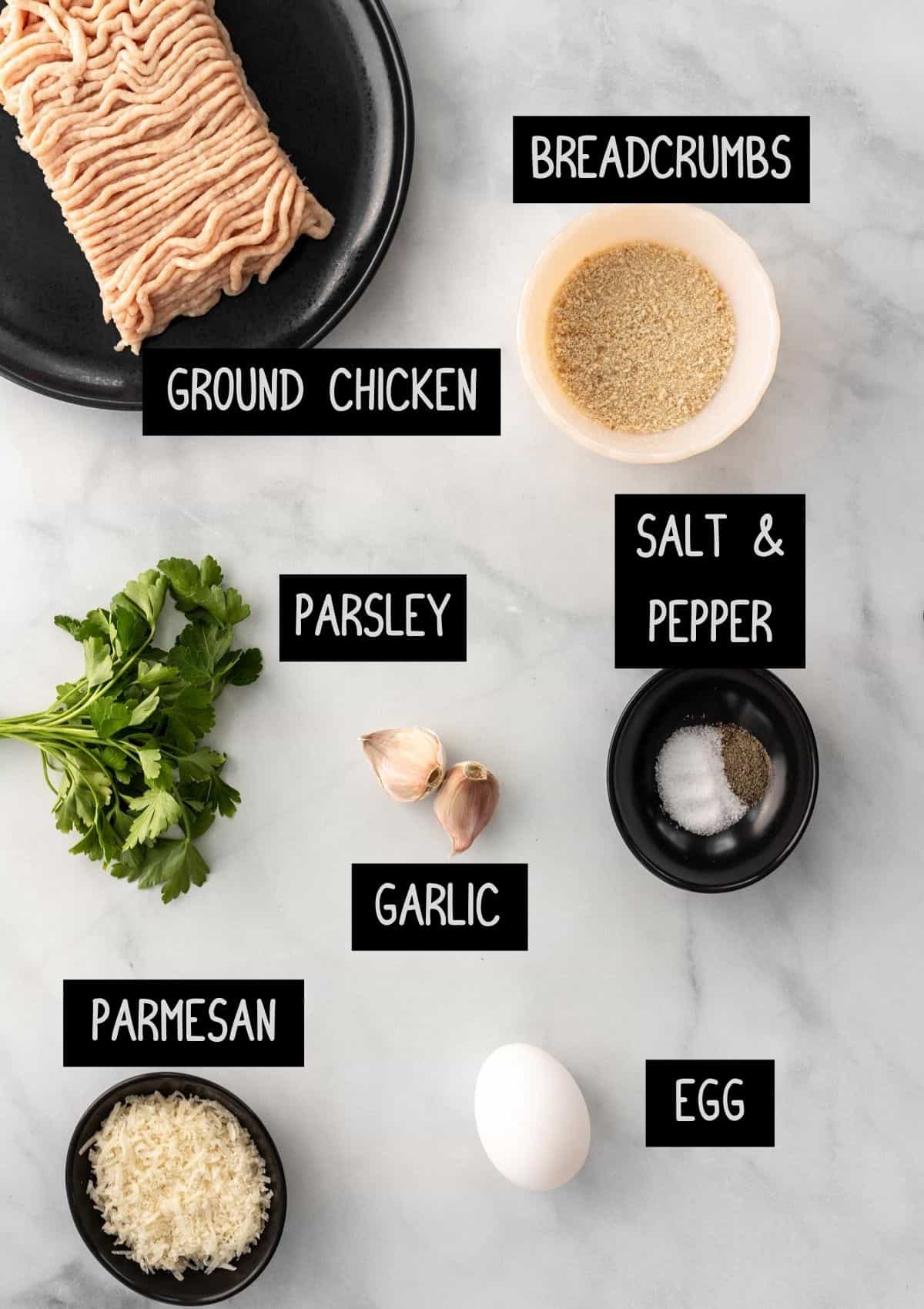 Labelled ingredients for the chicken meatballs (see recipe for details).