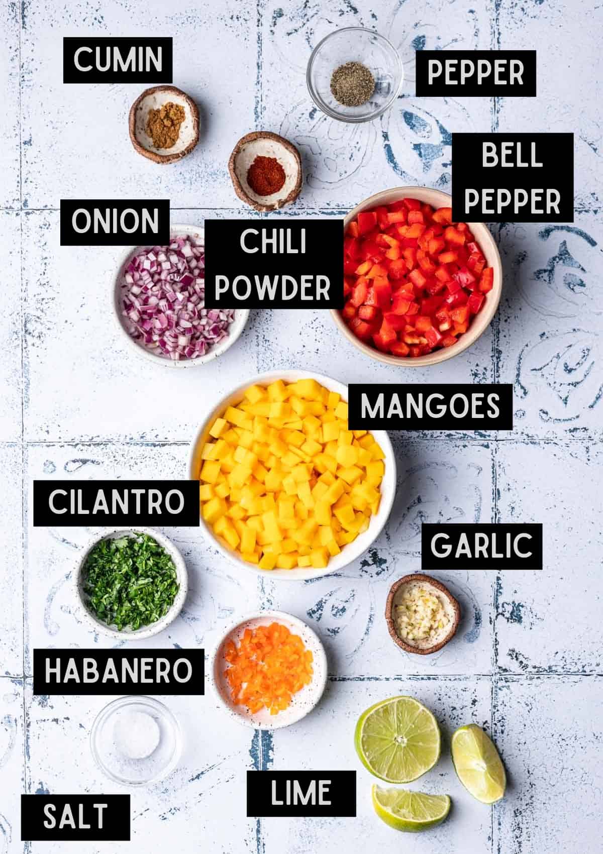 Labelled ingredients for mango habanero salsa (see recipe for details).