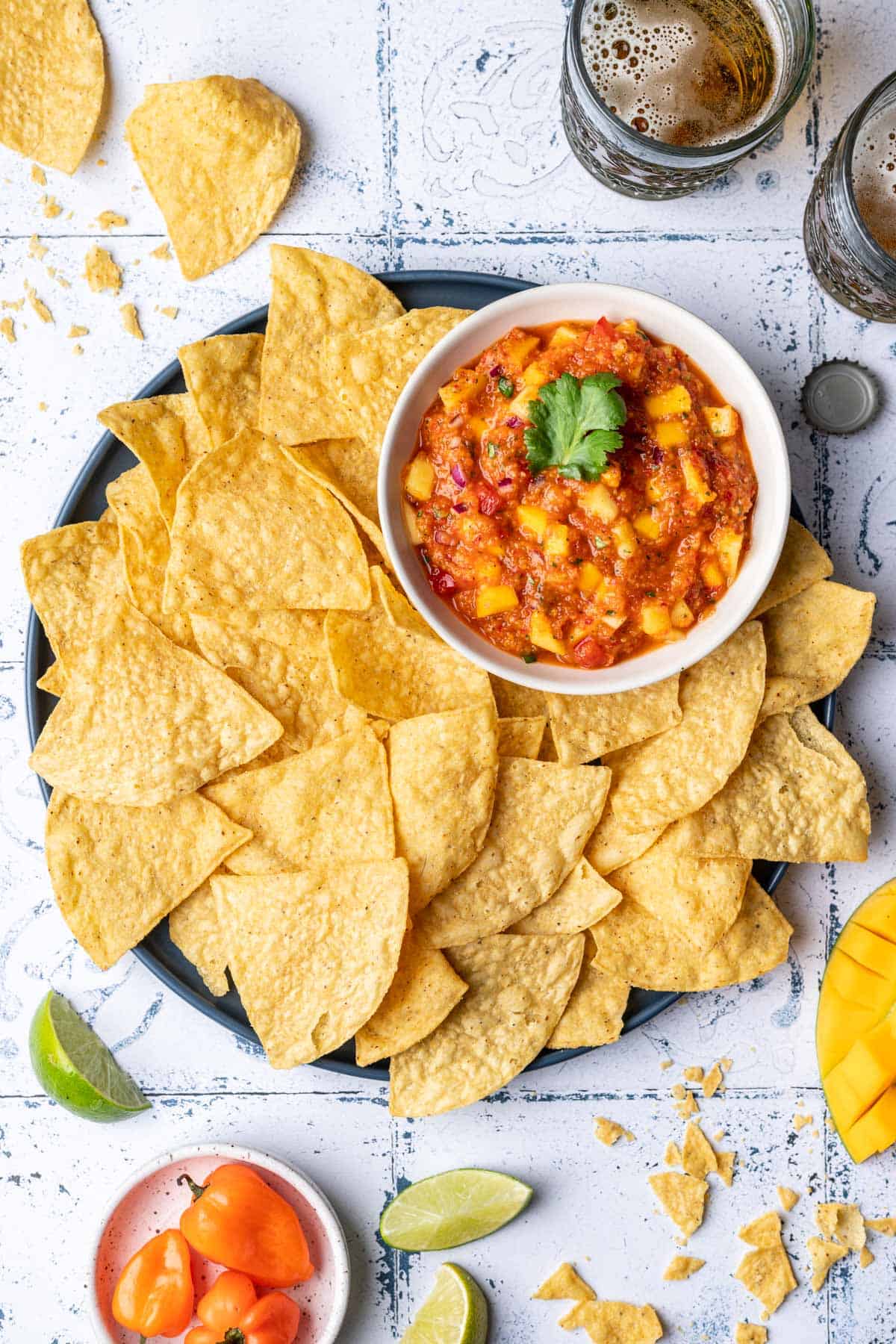 Mango habanero salsa served with tortilla chips.