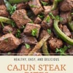 Pin graphic for cajun steak bites.