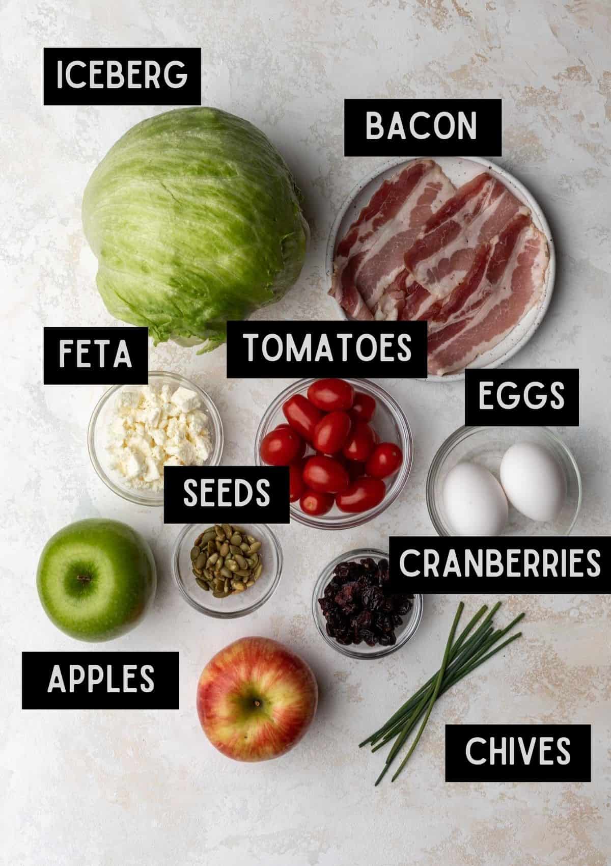 Labelled ingredients for fall cobb wedge salad (see recipe for details).