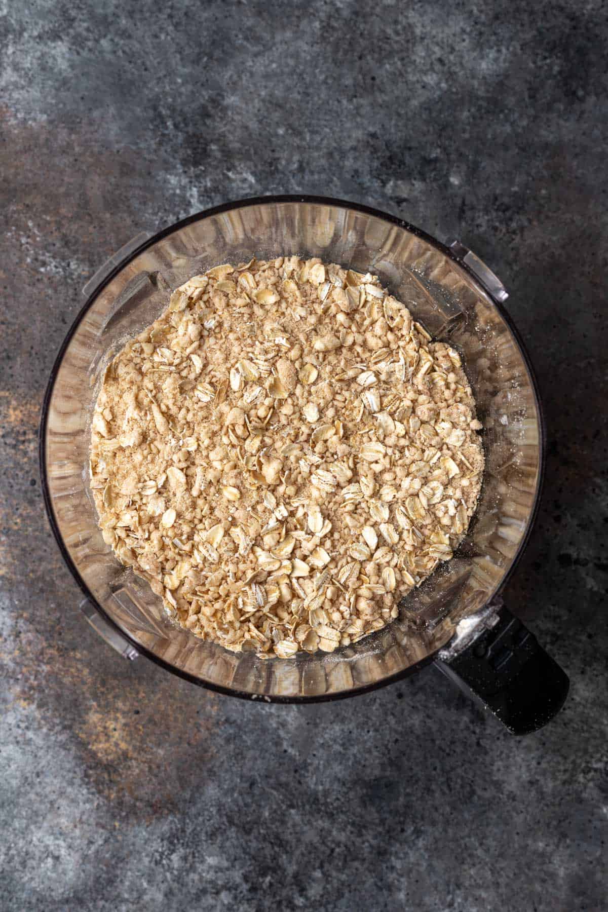 Butter, flour, and sugar pulsed to a crumb with oats added.