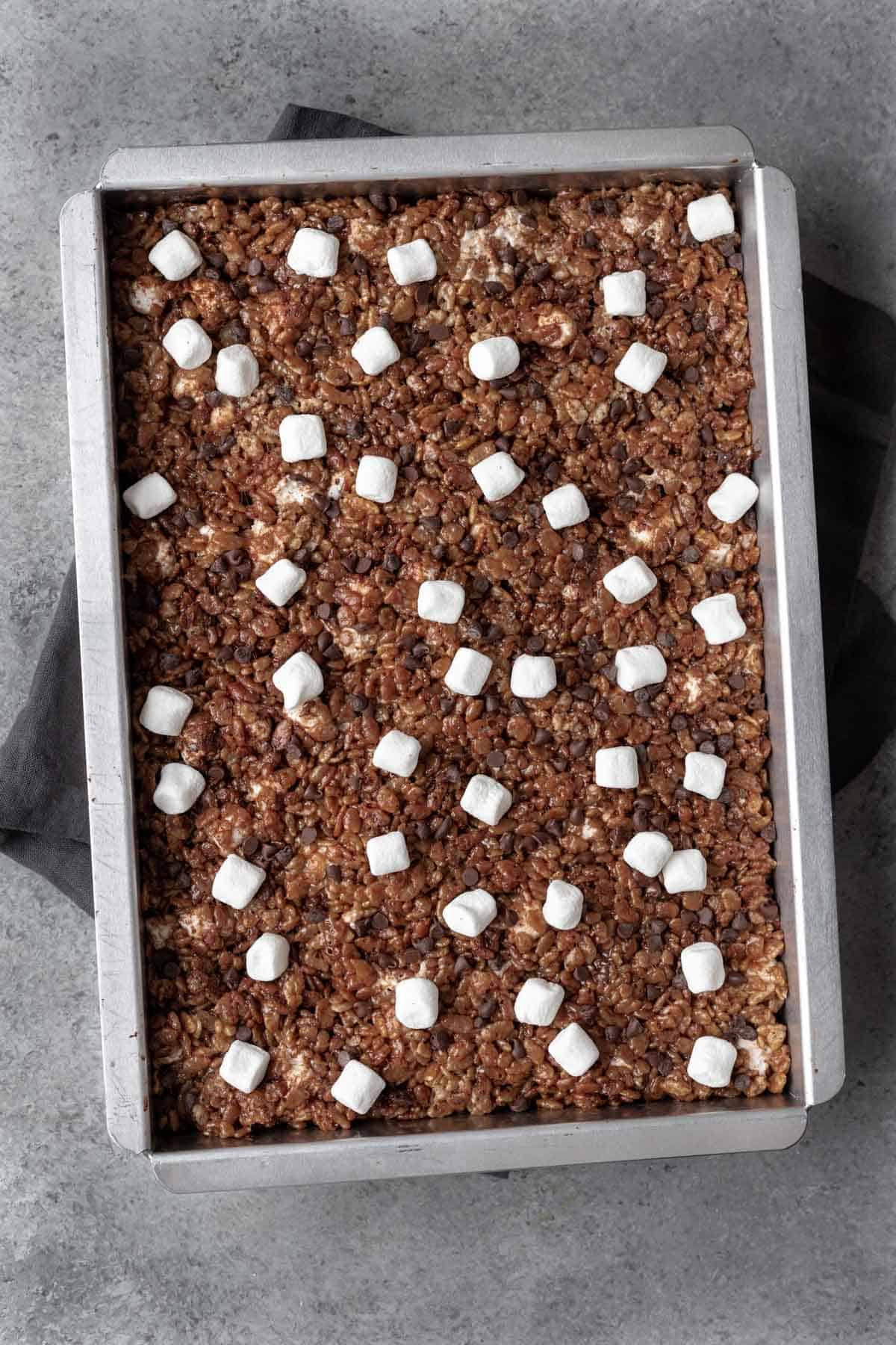 Hot chocolate rice krispie treats in a 9 x 13 baking pan.