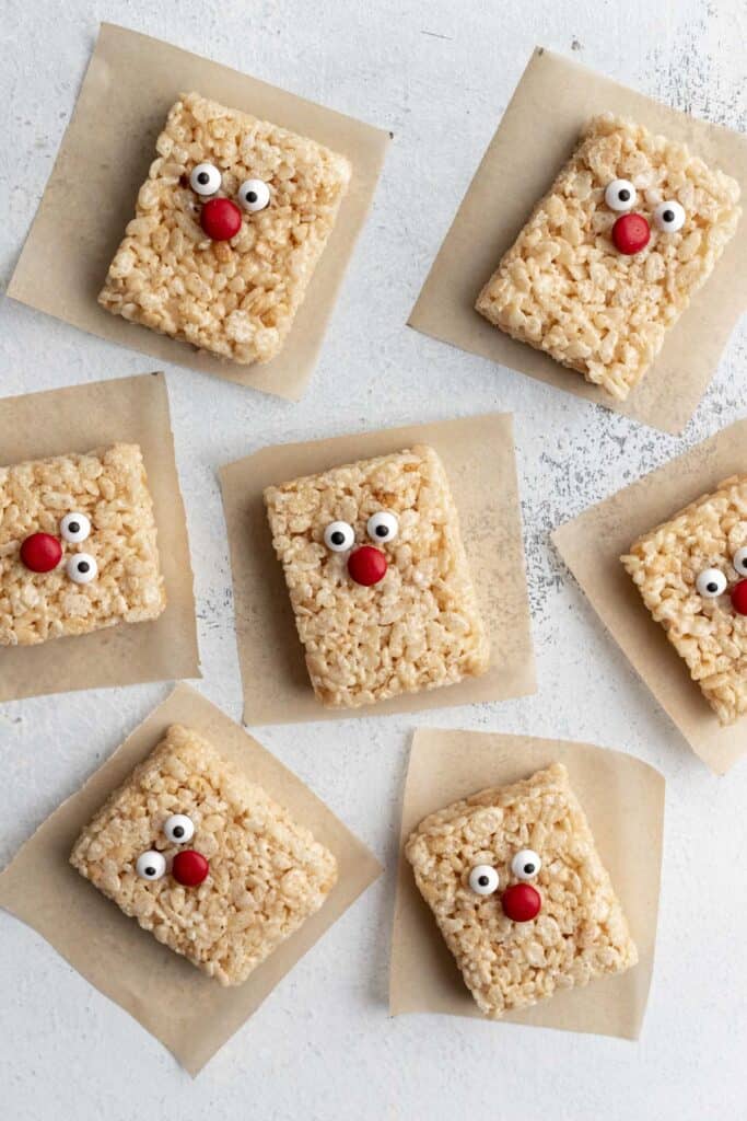 Rice krispie treats with candy eyes and a red candy nose.