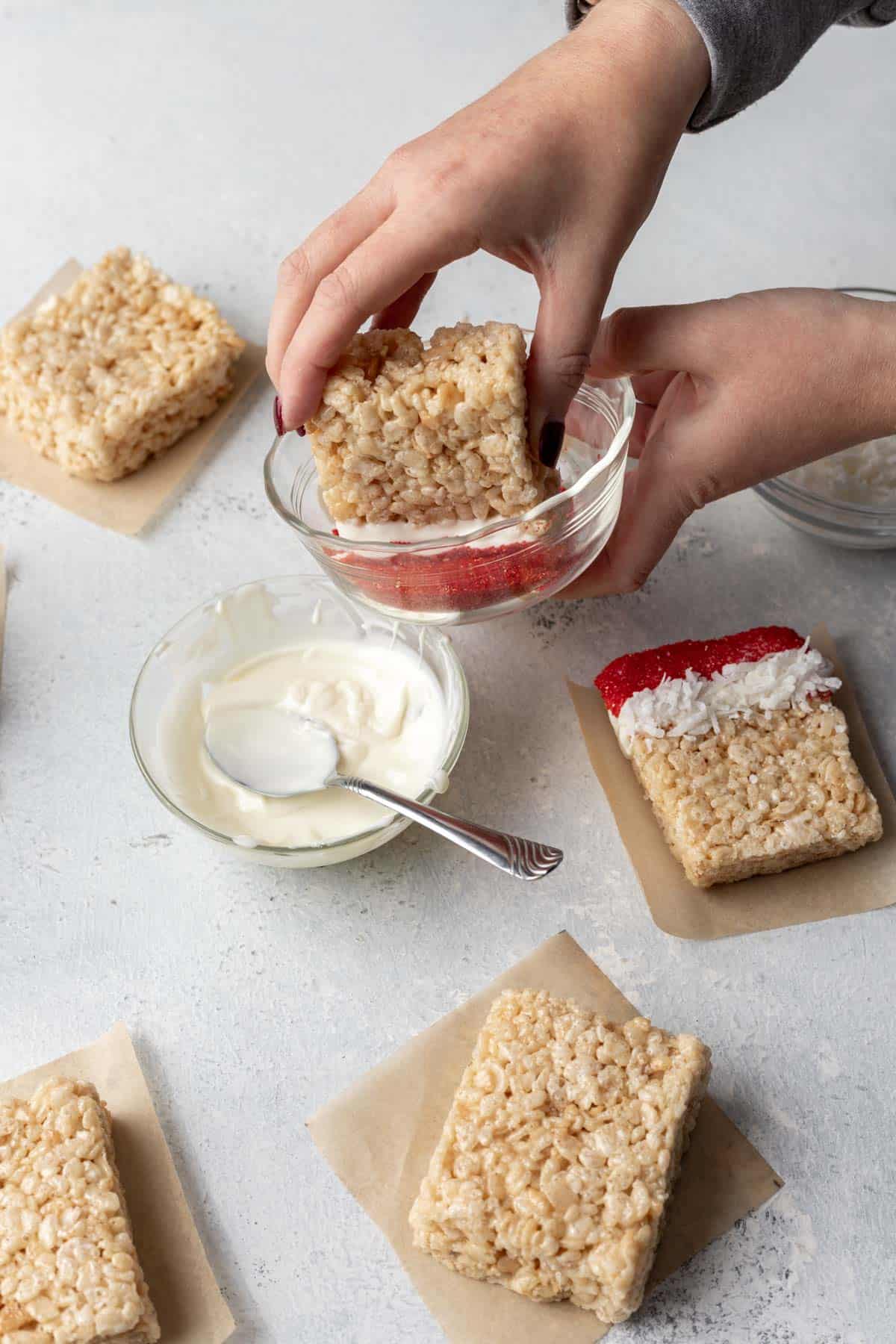 Top of a rice krispie treat dipped in melted white chocolate then in red sugar.