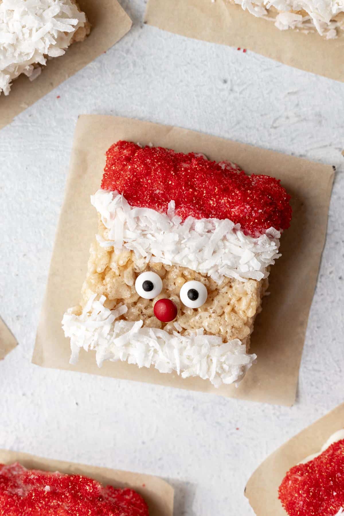 A holiday rice krispie treat decorated as santa.