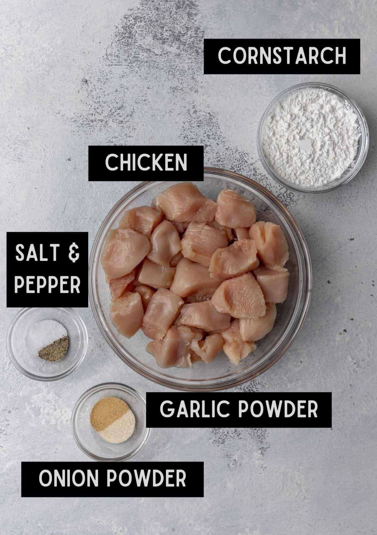 Labelled ingredients for crispy air fryer chicken (see recipe for details).
