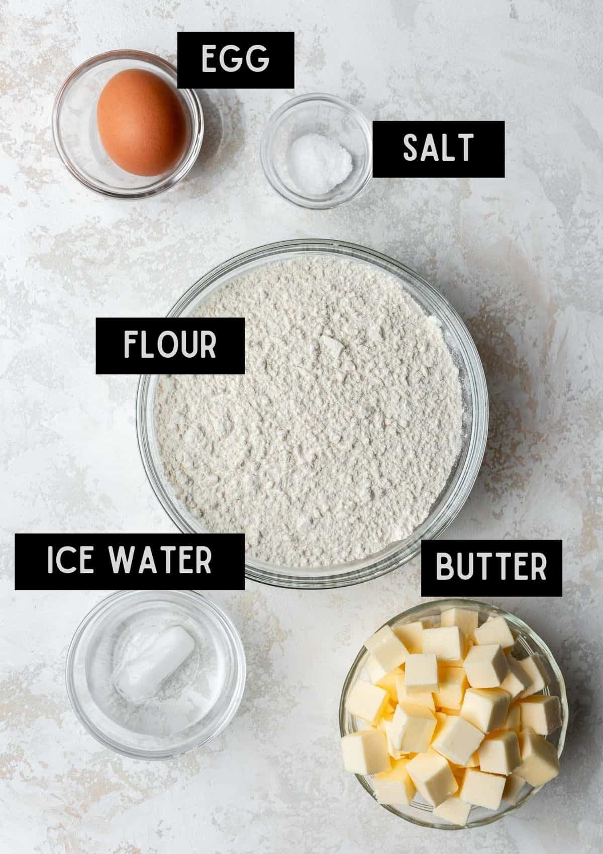 Labelled ingredients for a flakey quiche crust (see recipe for details).