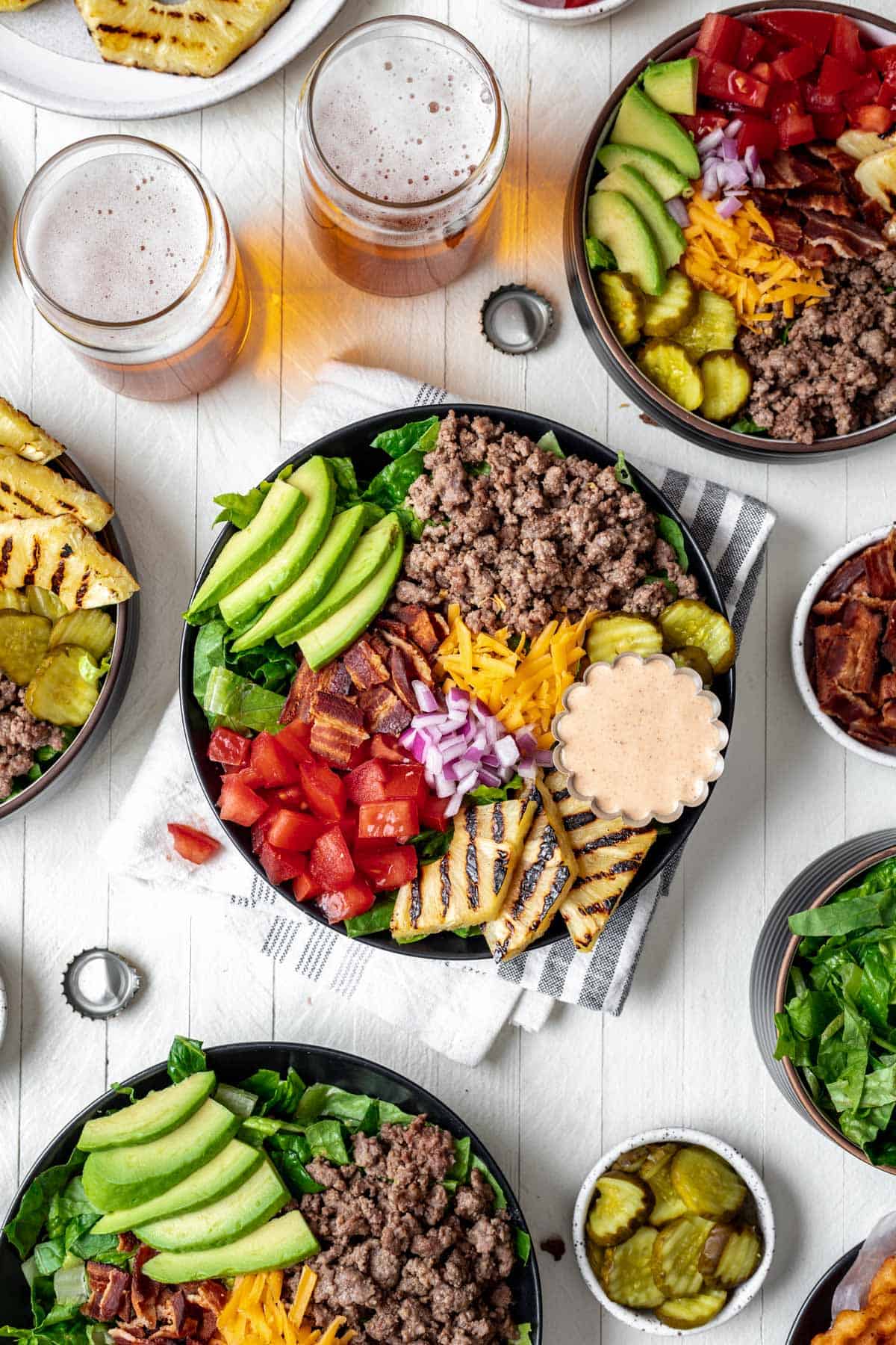 Quick and easy burger bowls with all the toppings and beer on the side.