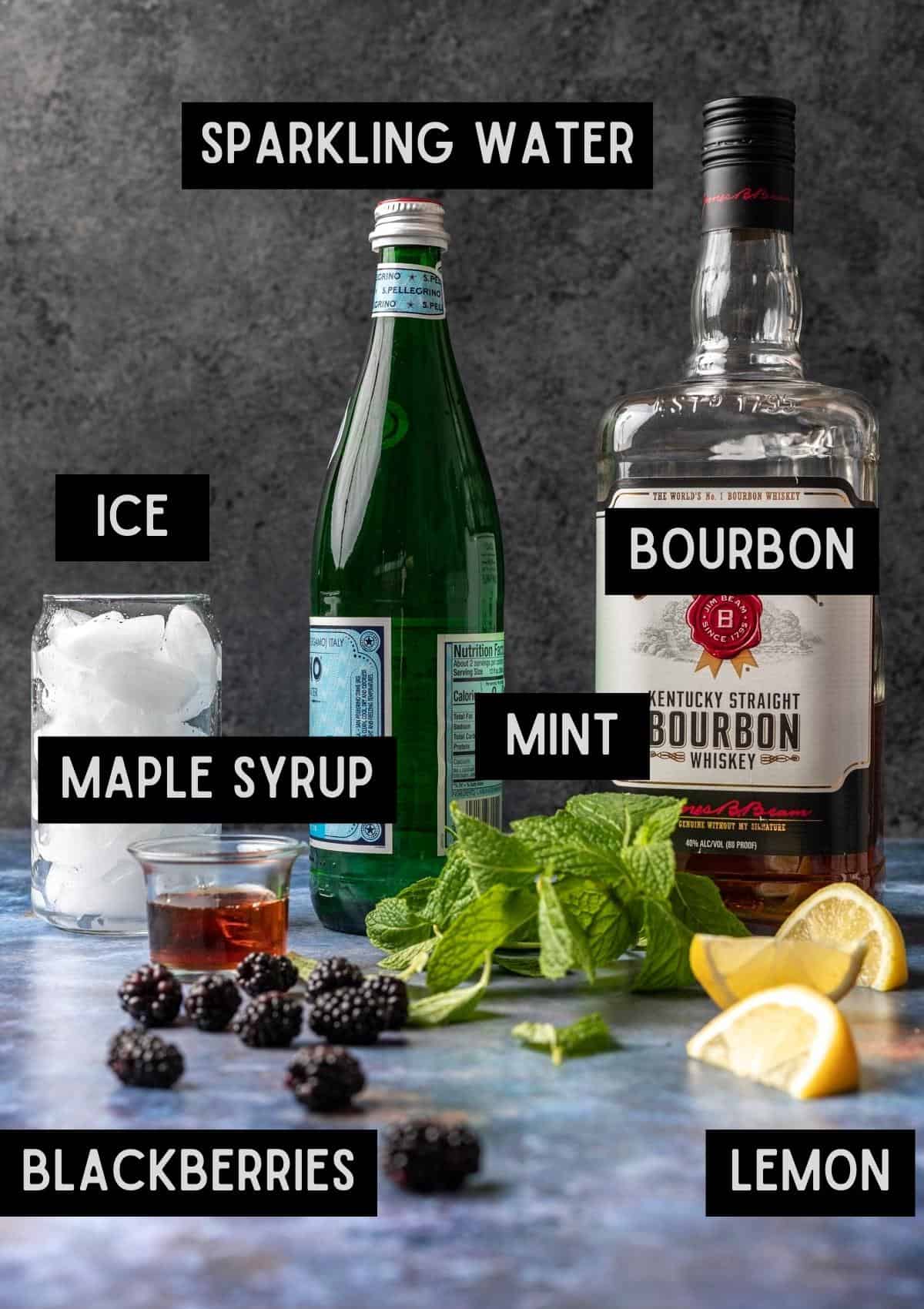 Labelled ingredients for blackberry bourbon smash (see recipe for details).