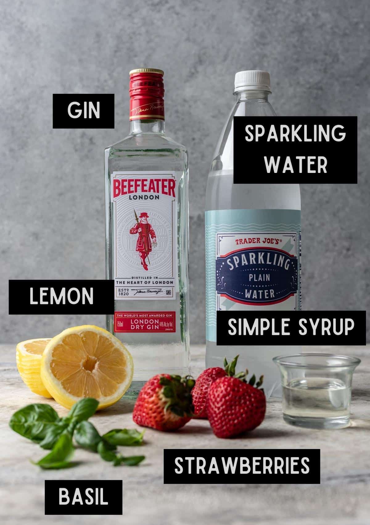 Labelled ingredients for strawberry basil gin smash (see recipe for details).