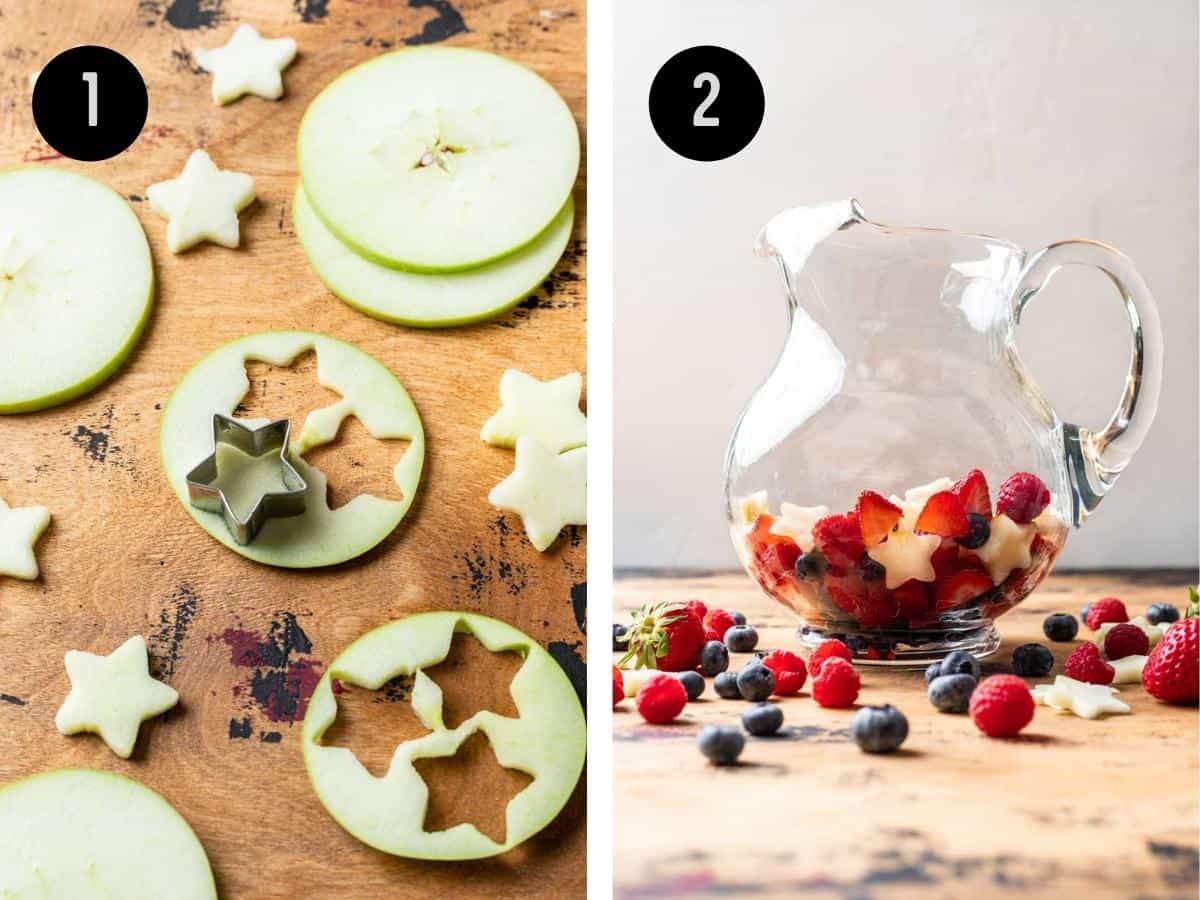 A small star-shaped cookie cutter cutting shapes out of apple slices. Berries and star-shaped fruit in a pitcher.