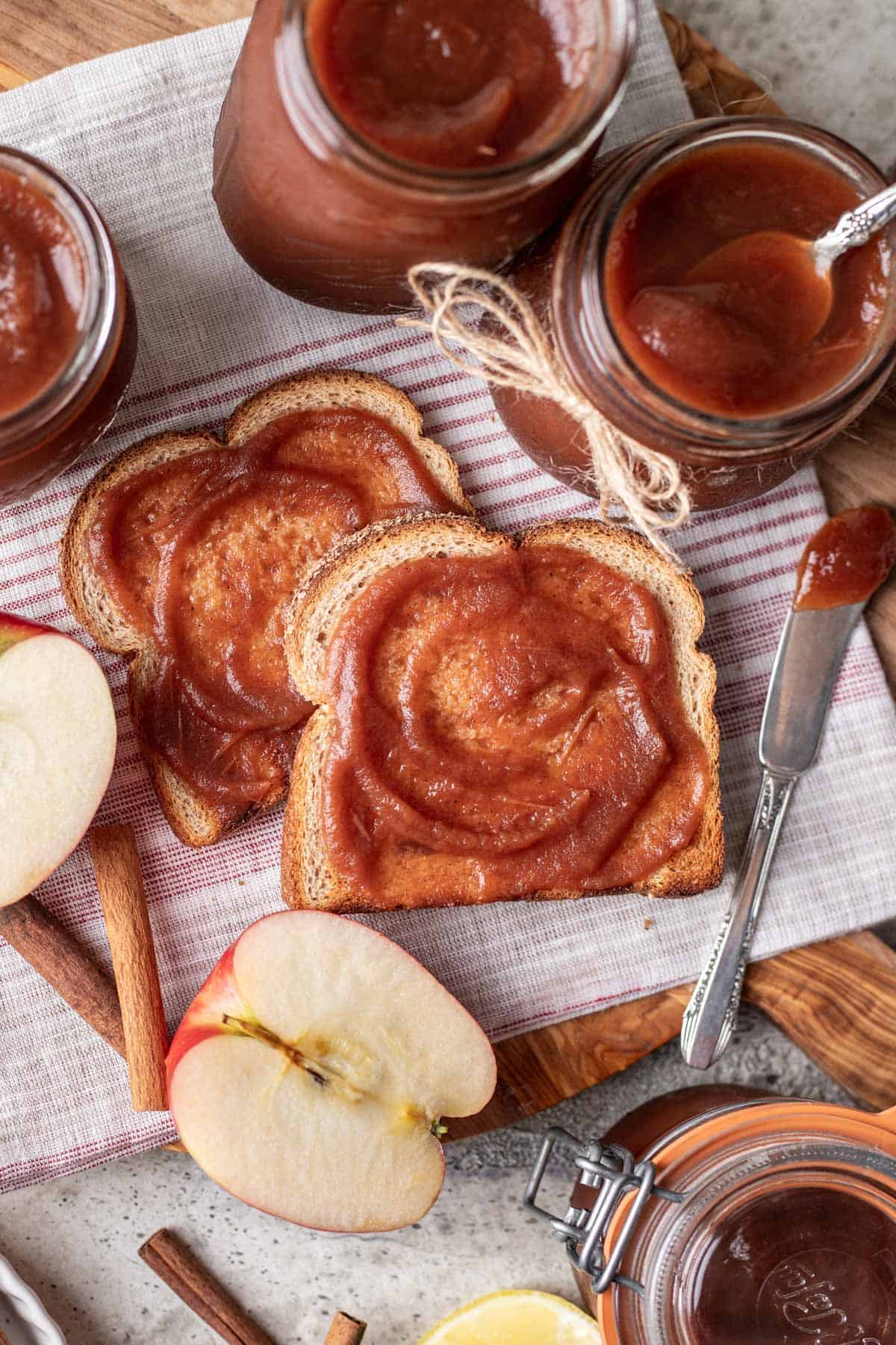 Instant pot apple butter spread on two pieces of toast.