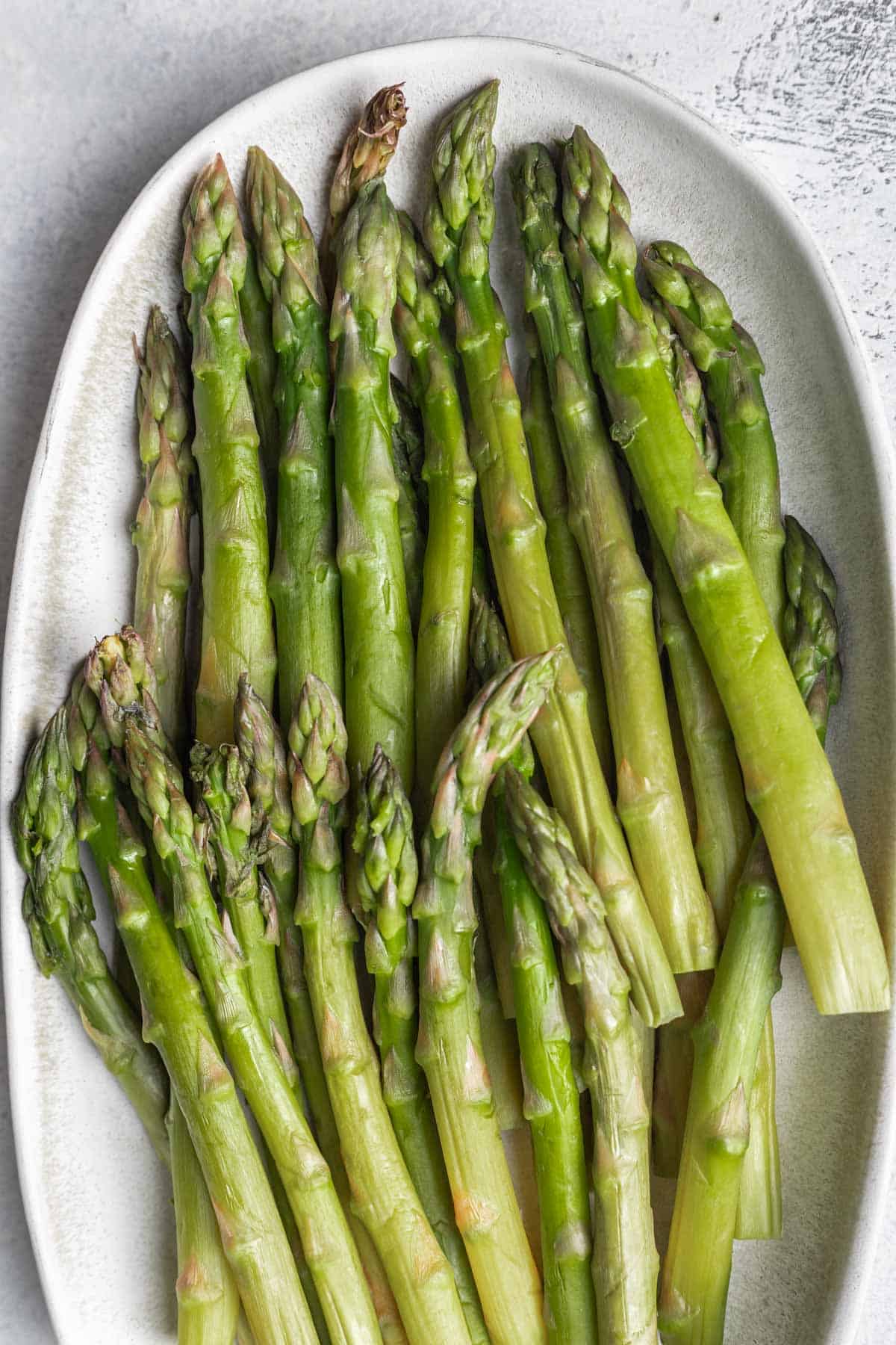Instant pot asparagus on a serving platter.