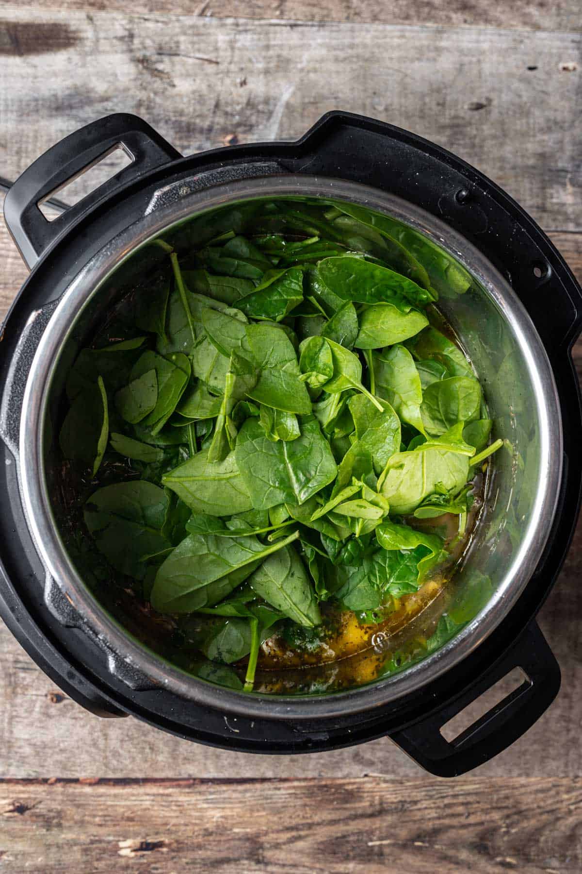 Spinach added to the instant pot.