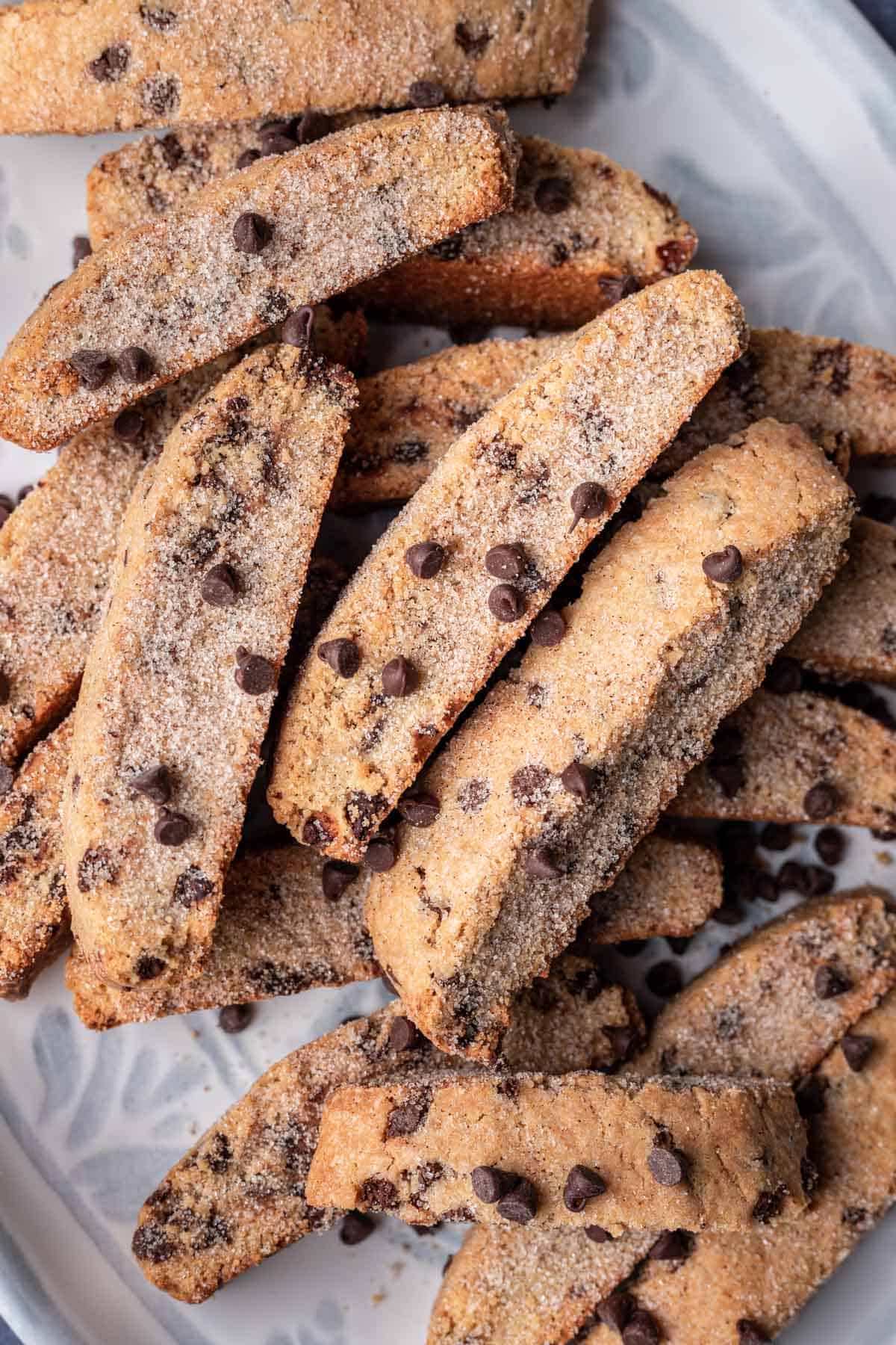 Chocolate chip mandel bread with cinnamon sugar on a platter.