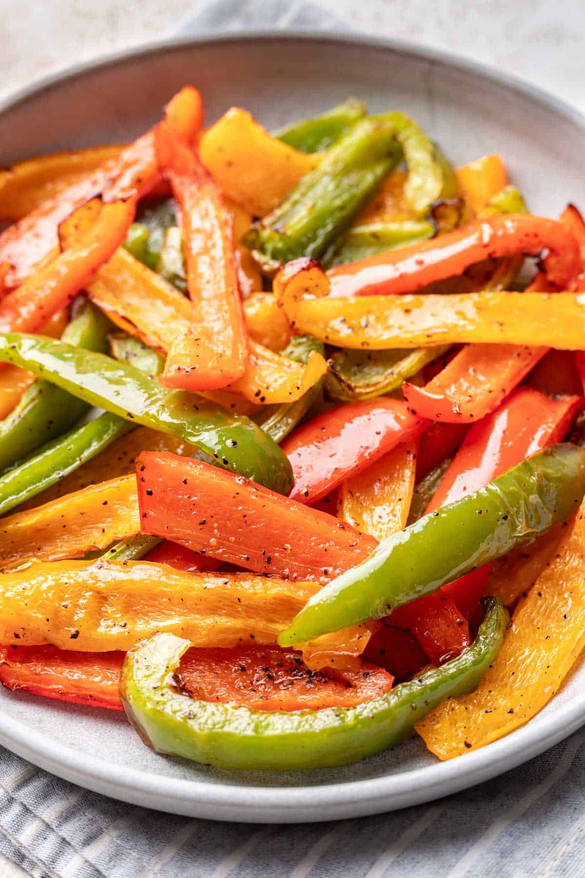 Air fryer bell peppers in a serving bowl.