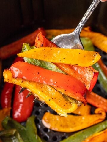 Air fryer bell peppers on a fork.