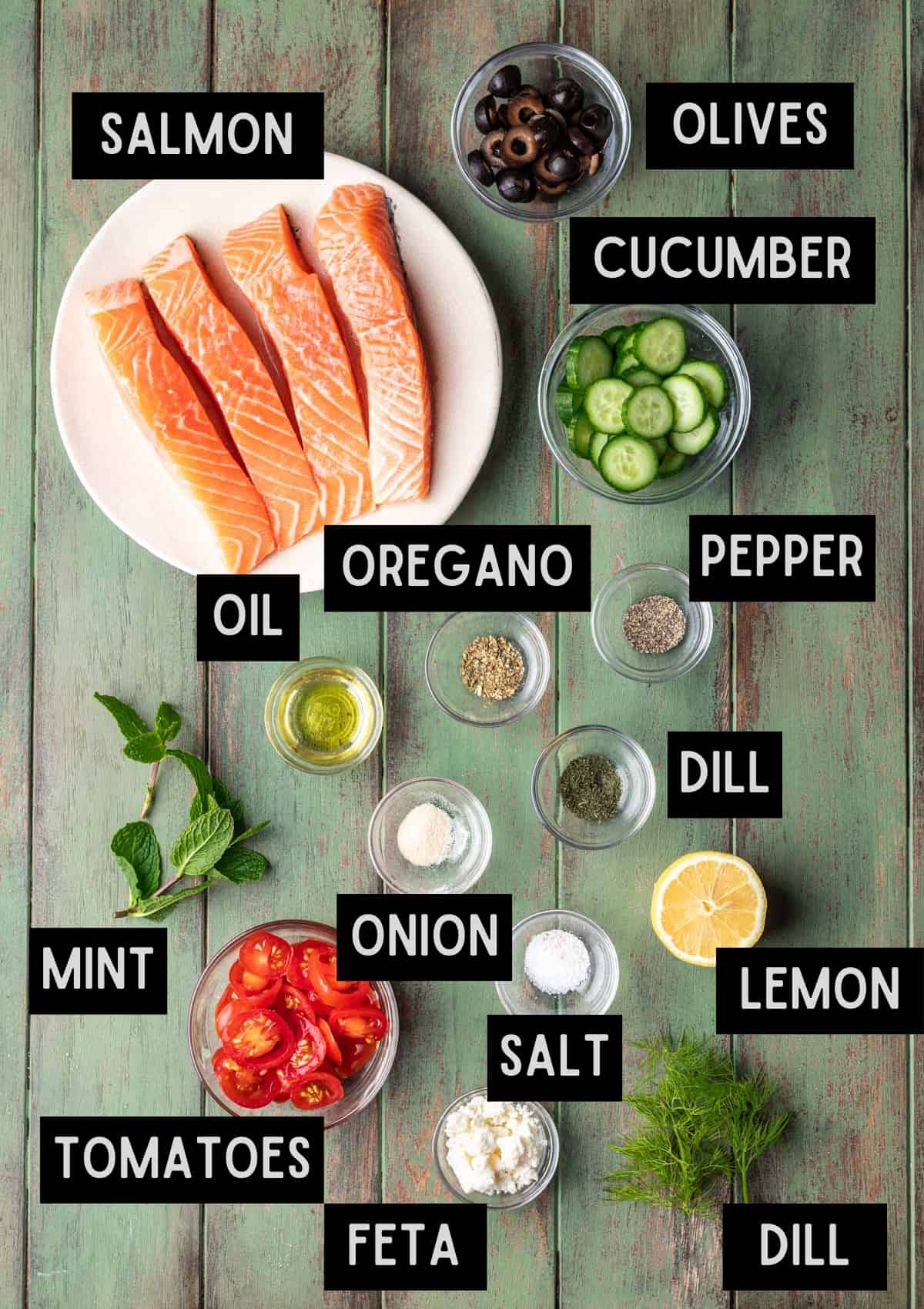 Labelled ingredients for greek salmon (see recipe for details).