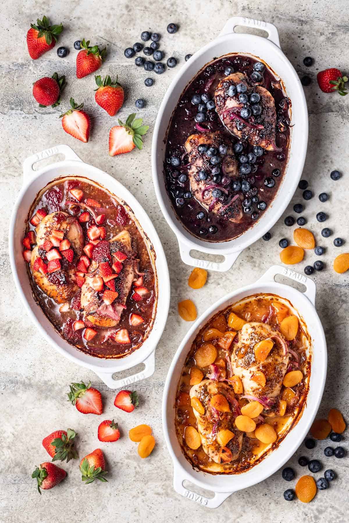 3 different flavors of baked jelly chicken in white baking dishes.