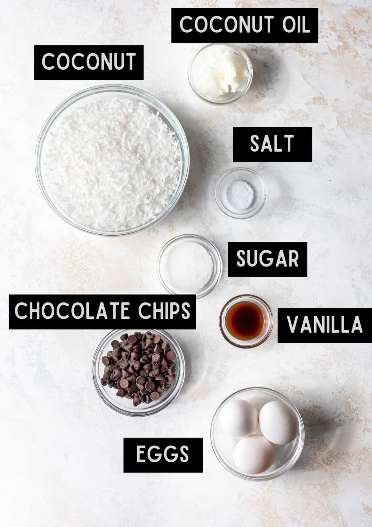 Labelled ingredients for coconut macaroons without condensed milk (see recipe for details).