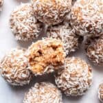 Lemon bliss balls coated in coconut.