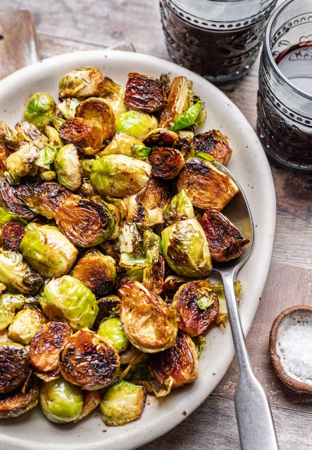 Maple balsamic brussels sprouts on a serving platter.