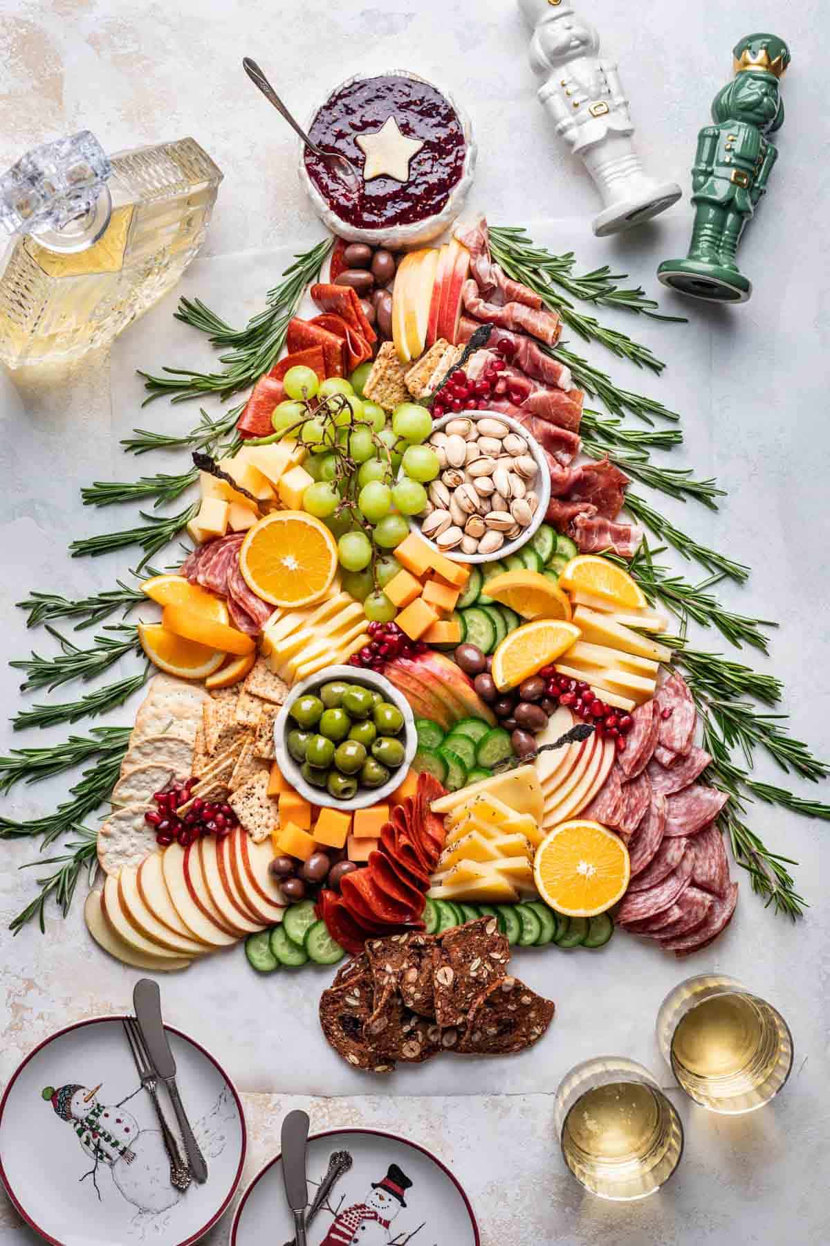 Christmas charcuterie board shaped like a Christmas tree.