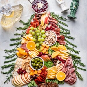 Christmas charcuterie board shaped like a Christmas tree.