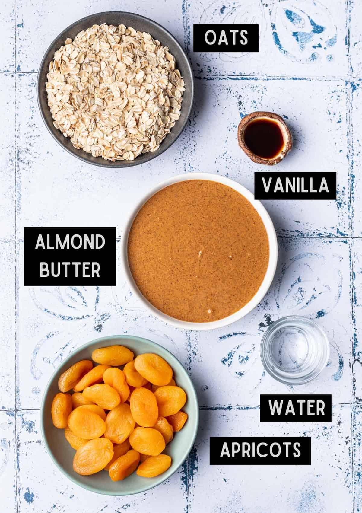 Labelled ingredients for apricot bliss balls (see recipe for details).
