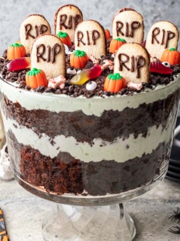 Halloween trifle with layers of pistachio cream and chocolate brownies.
