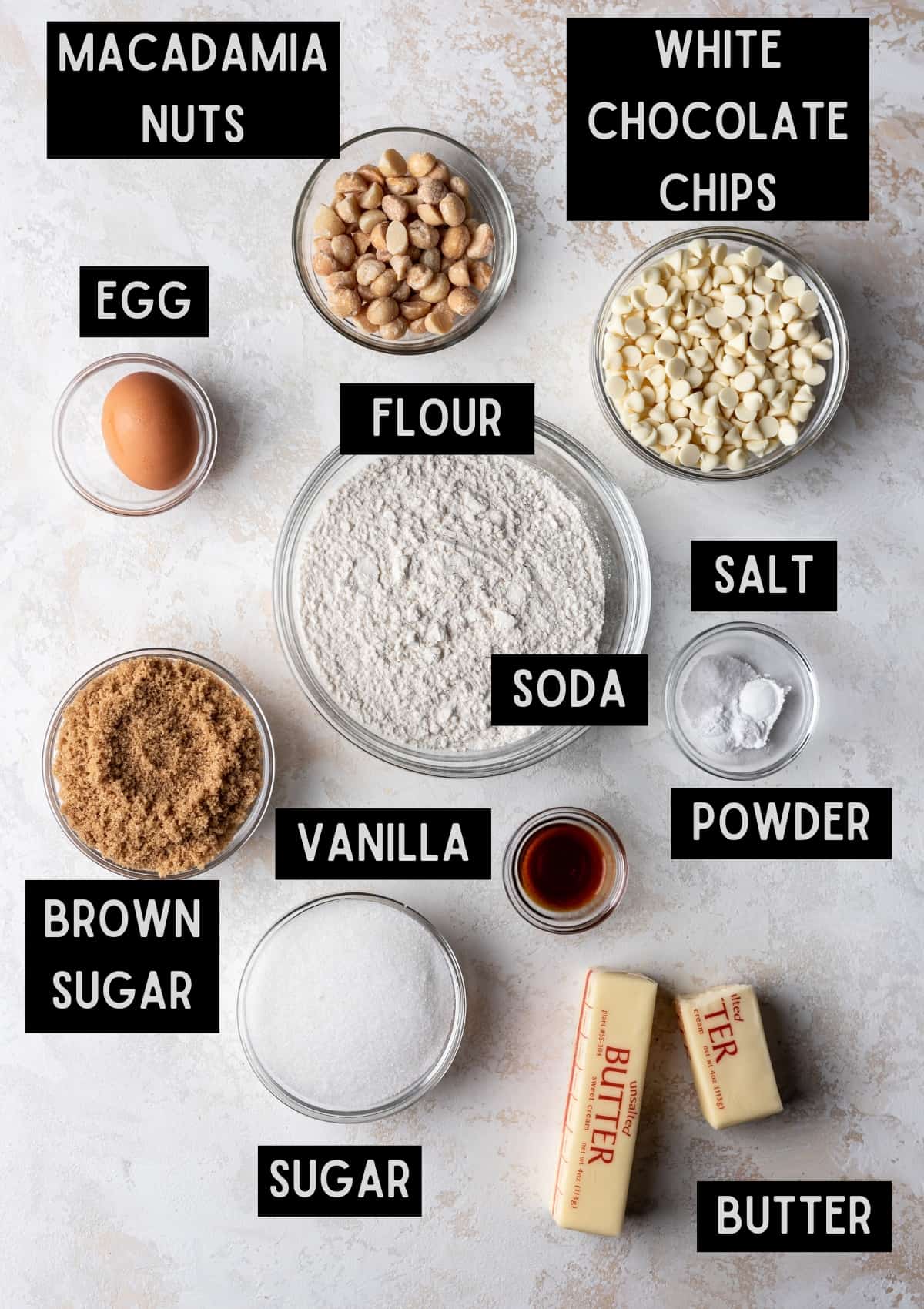 Labelled ingredients for white chocolate macadamia nut cookies (see recipe for details).