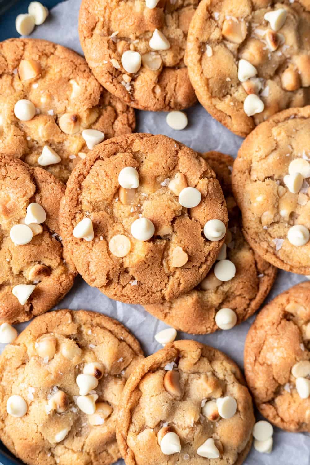 White chocolate macadamia nut cookies stacked on each other.