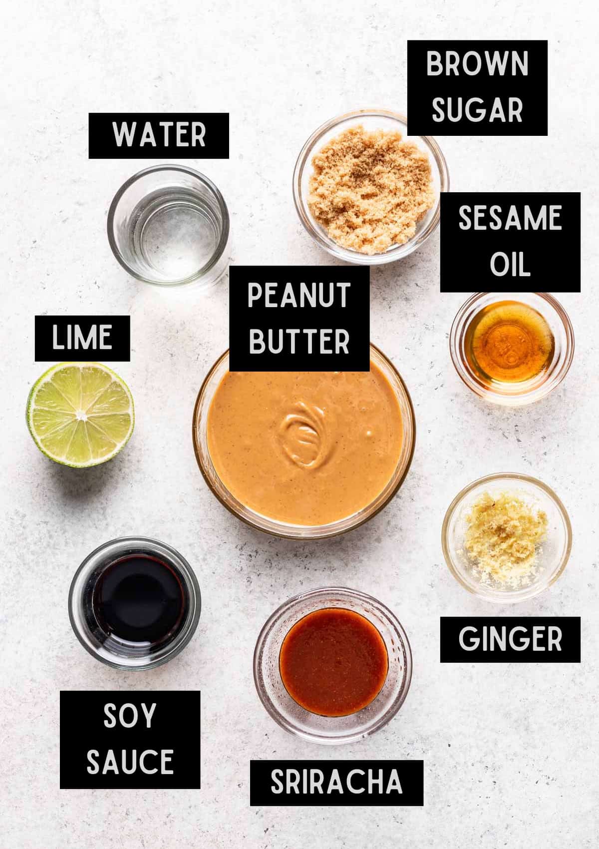 Labelled ingredients for spicy peanut sauce (see recipe for details).