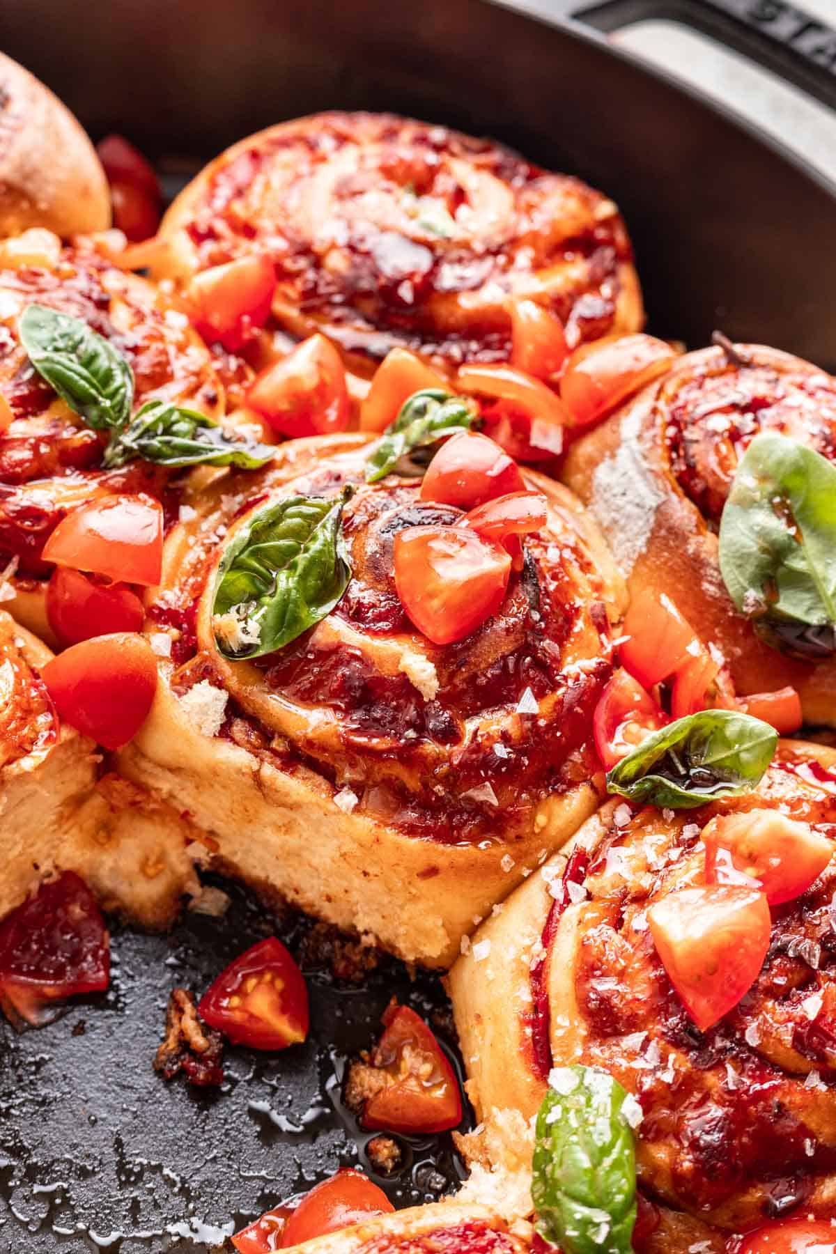 Side view of a caprese roll to show the fluffy dough on the side.