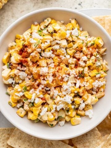 Street corn salsa in a white bowl.