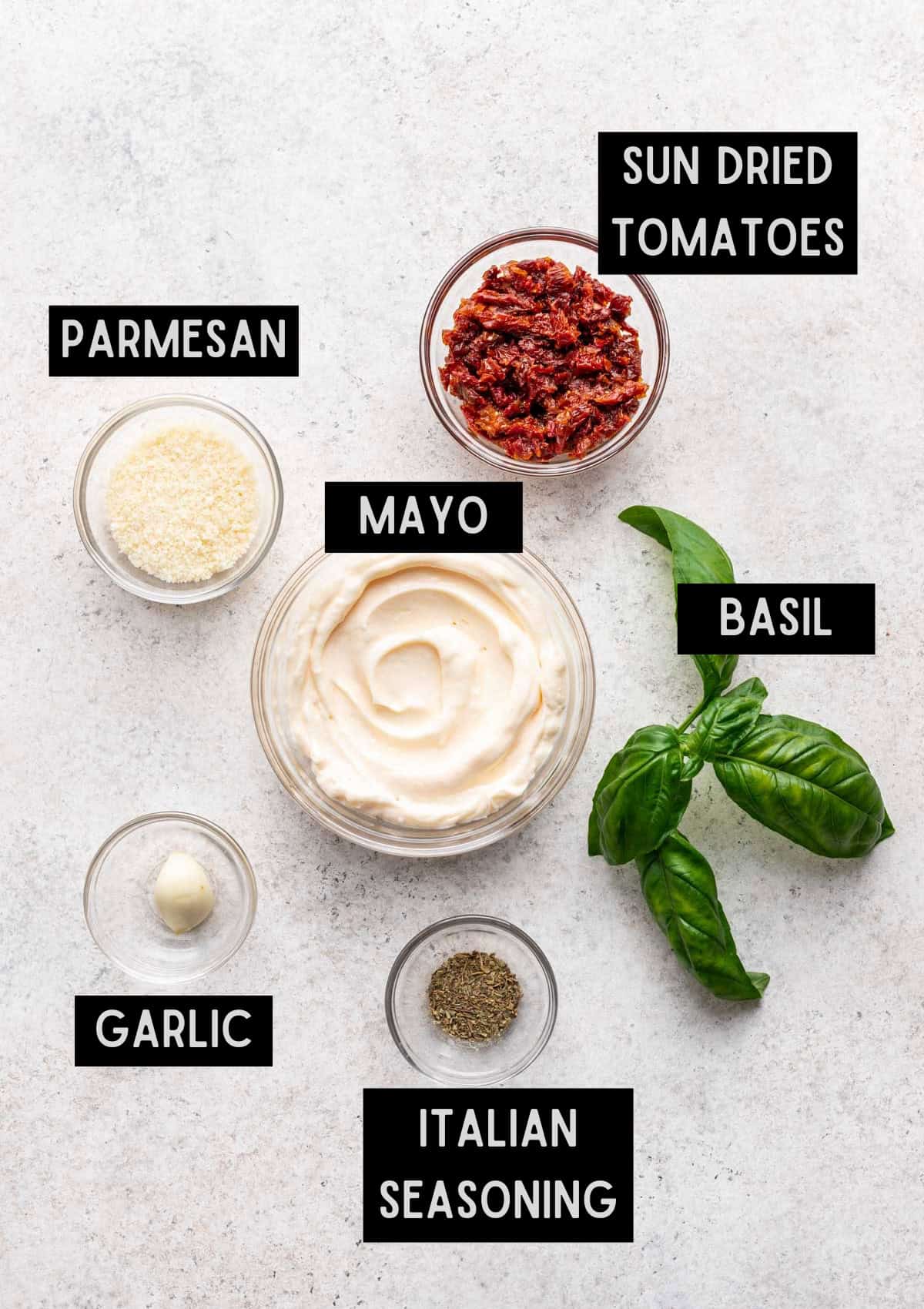 Labelled ingredients for sun dried tomato aioli (see recipe for details).