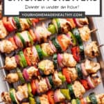 Pin graphic for yogurt marinated chicken skewers.