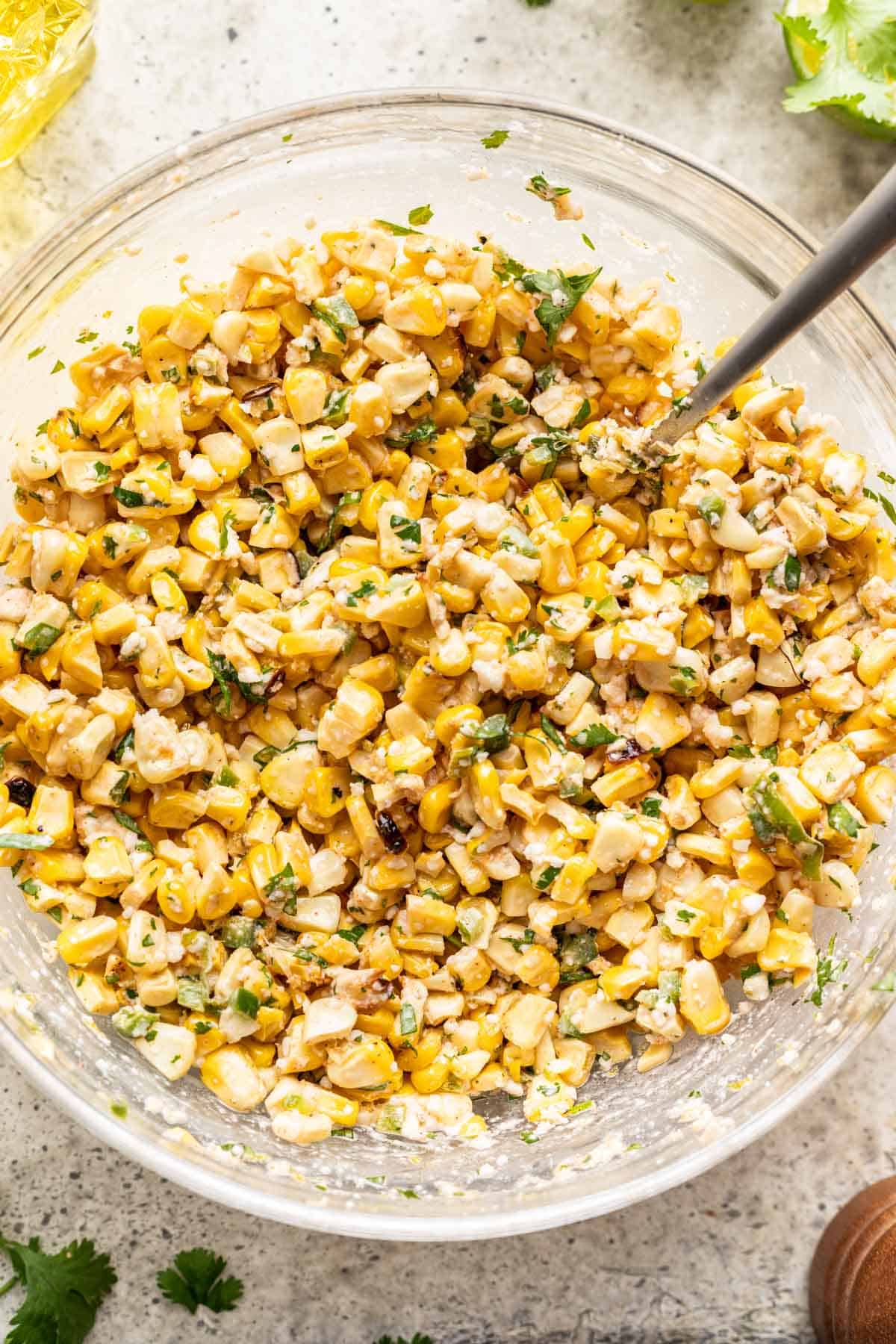 Street corn salsa mixed in a clear bowl.
