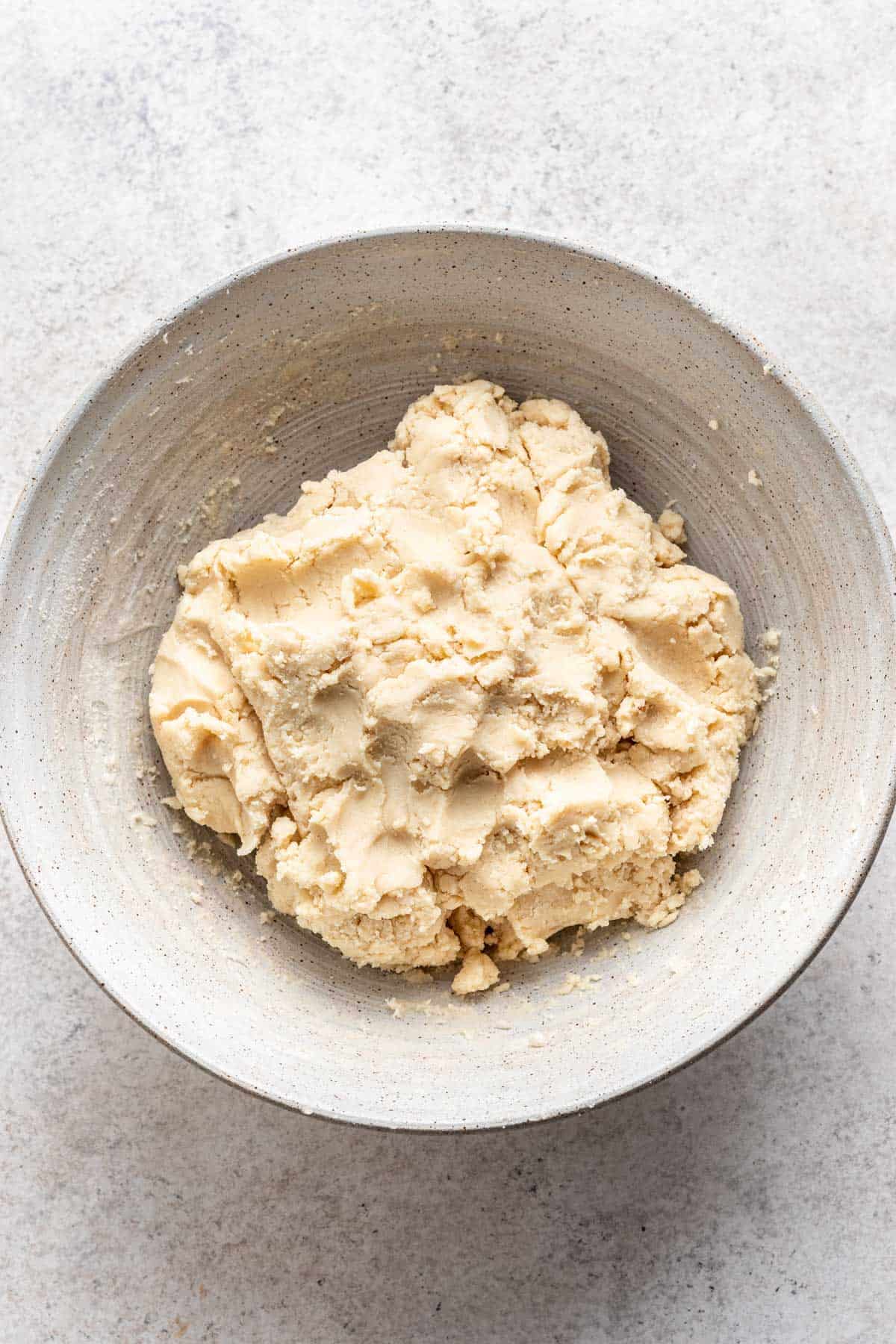 Shortbread dough in a bowl.