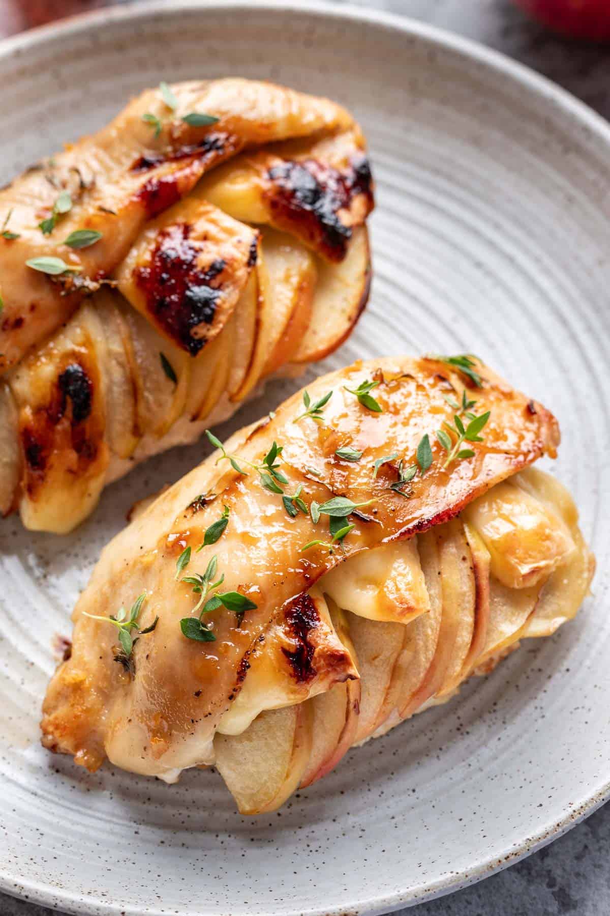 Chicken stuffed with sliced apples and brie.