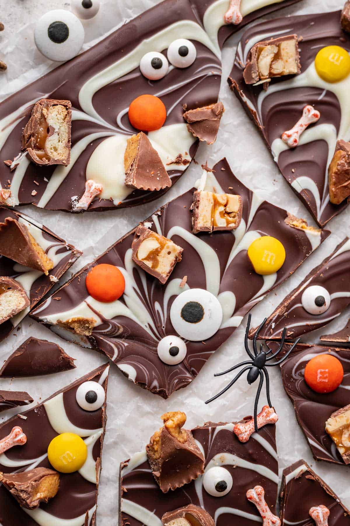Halloween candy bark with candy pieces on top.