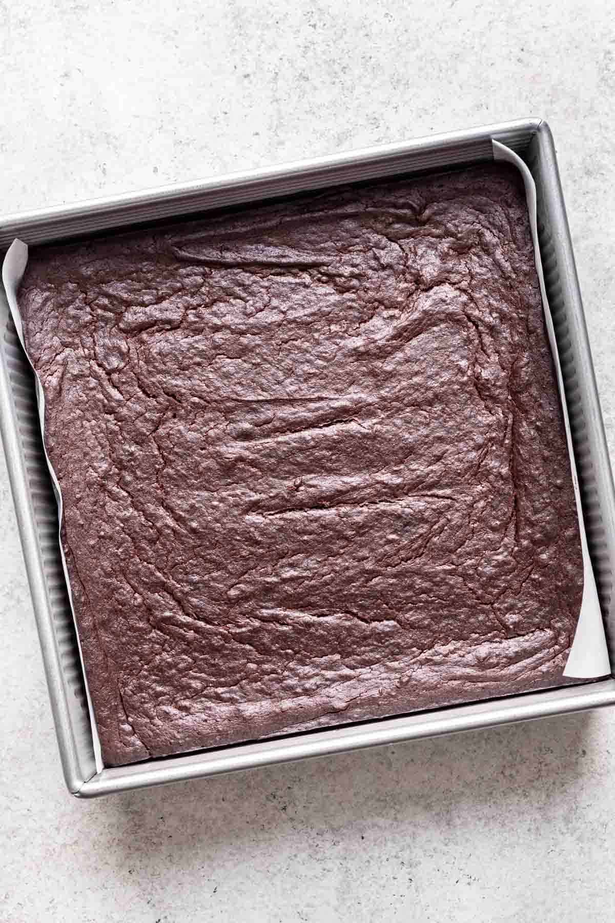 Baked brownies cooling in their pan.